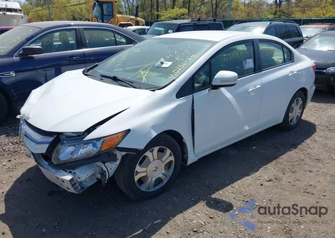2012 Honda Civic Hybrid z USA, uszkodzony, nr VIN JHMFB4F24CS007240